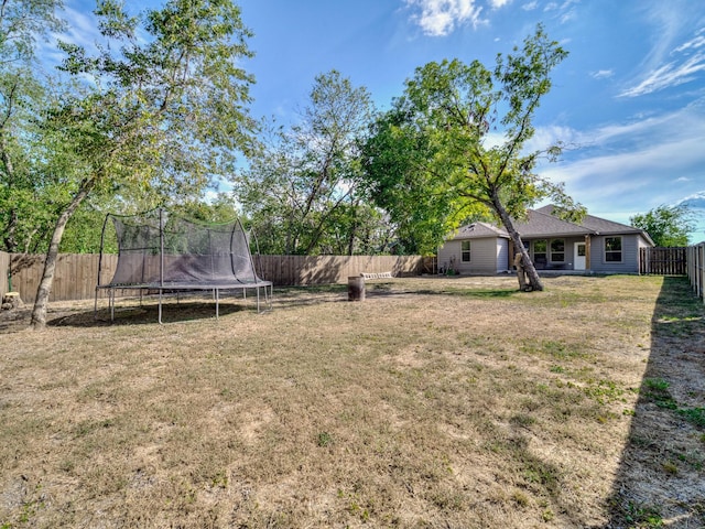 view of yard featuring a trampoline