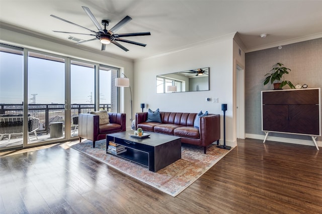 living room with crown molding and dark hardwood / wood-style flooring