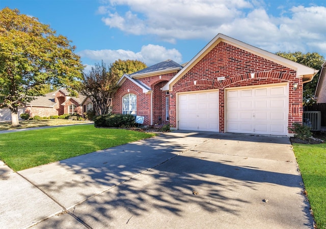 view of property featuring central AC and a front lawn