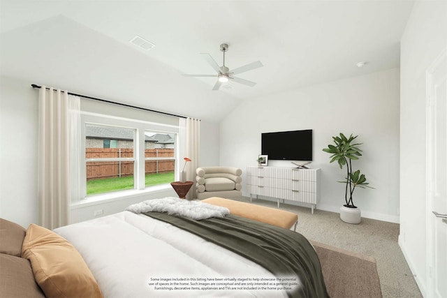 bedroom featuring carpet flooring, ceiling fan, and vaulted ceiling