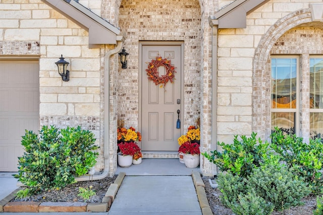 entrance to property with a garage