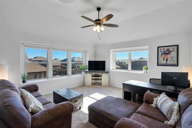 living room with light carpet, ceiling fan, and vaulted ceiling