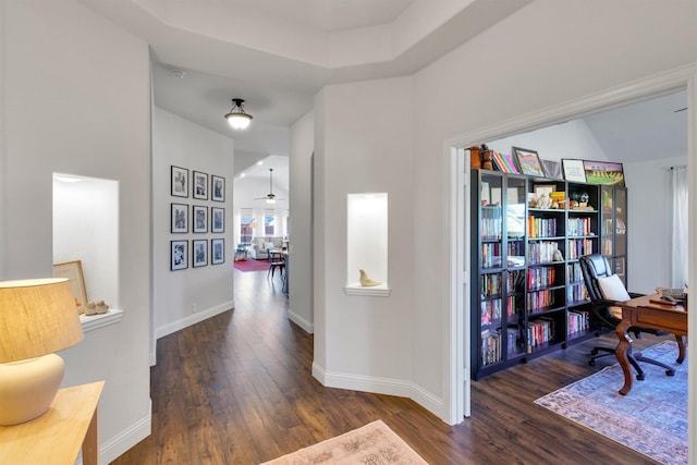 hallway featuring dark wood-type flooring