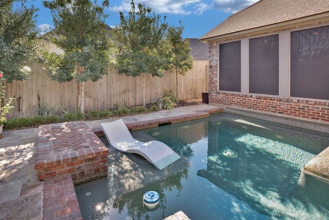 view of pool featuring a patio area