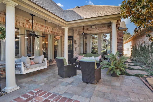 view of patio featuring outdoor lounge area, ceiling fan, and french doors