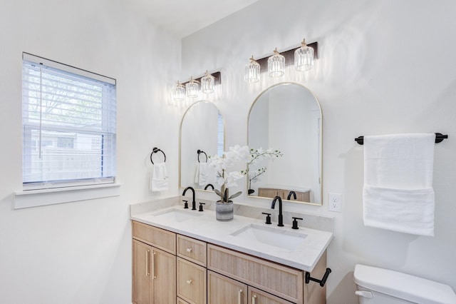 1724 S Hughes Ave, Fort Worth, TX 76105 - bathroom with toilet and double vanity
