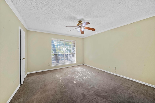 carpeted spare room featuring ceiling fan, a textured ceiling, and ornamental molding