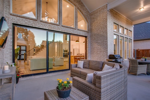 view of patio / terrace featuring an outdoor hangout area and area for grilling