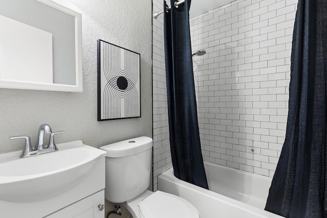 full bathroom with shower / bath combination with curtain, toilet, and vanity