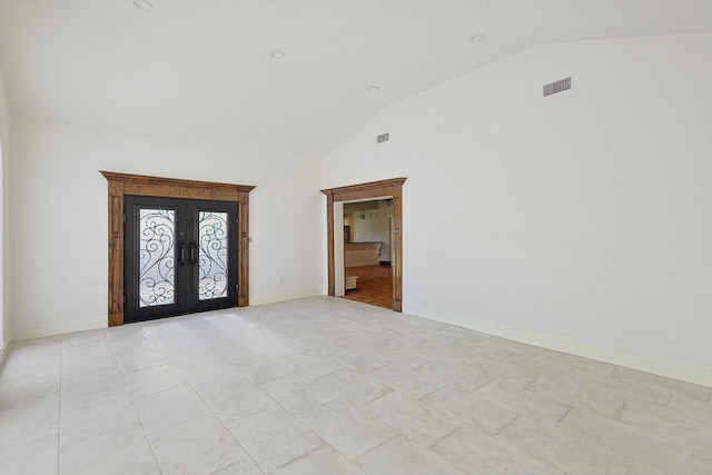 interior space with french doors and high vaulted ceiling