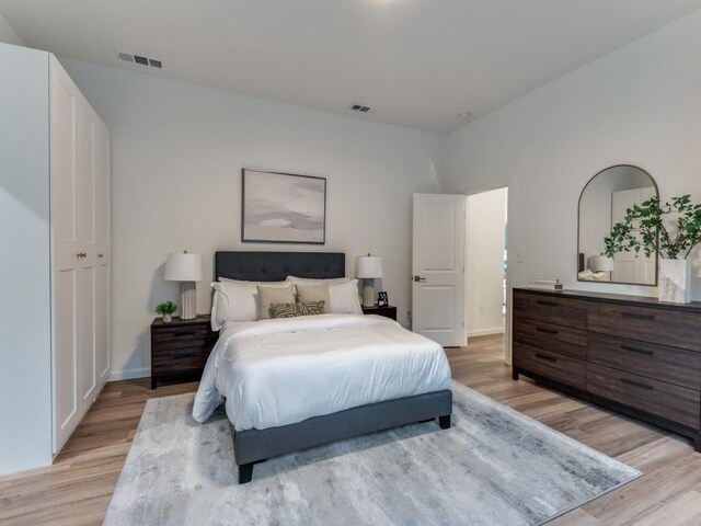 bedroom featuring light wood-type flooring