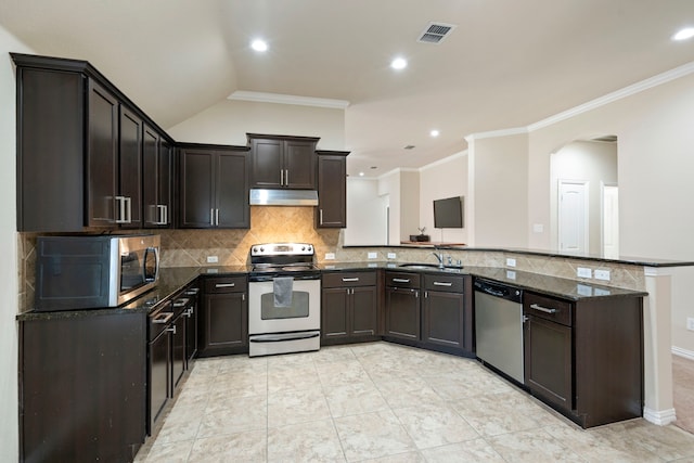 kitchen with kitchen peninsula, ornamental molding, dark stone counters, stainless steel appliances, and sink