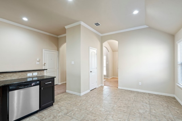 kitchen with dishwasher, vaulted ceiling, and ornamental molding