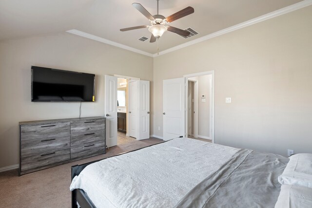 carpeted bedroom featuring lofted ceiling, ensuite bathroom, ceiling fan, and crown molding