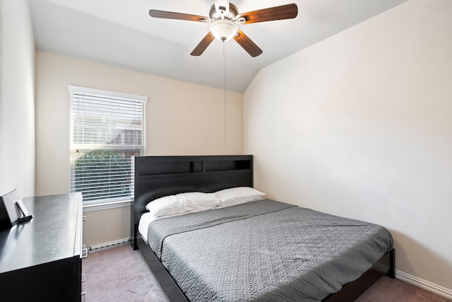 carpeted bedroom featuring ceiling fan and lofted ceiling