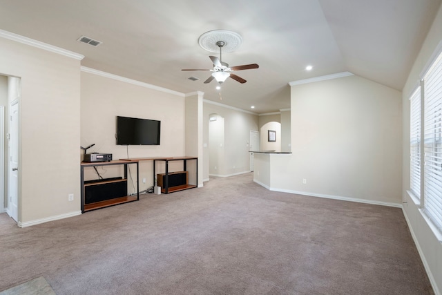 living room featuring carpet, ceiling fan, ornamental molding, and vaulted ceiling