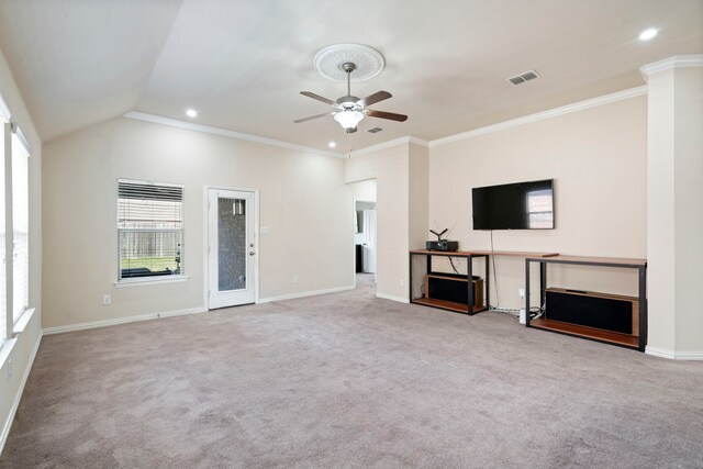 unfurnished living room with ceiling fan, ornamental molding, light carpet, and lofted ceiling