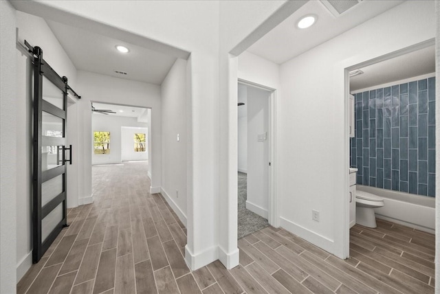 hallway with a barn door