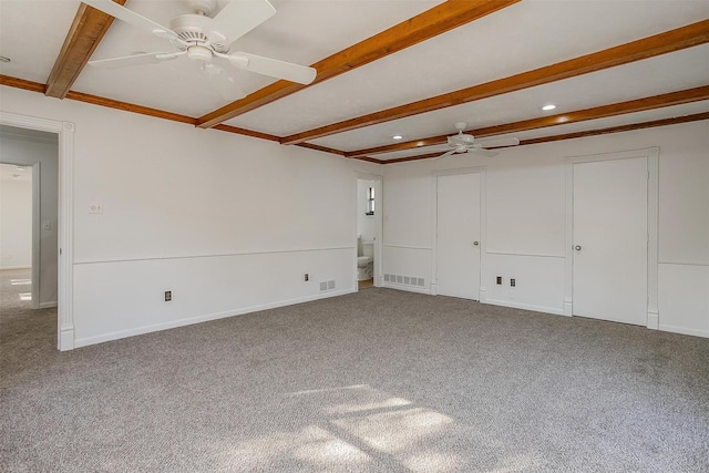 interior space featuring beamed ceiling and ceiling fan