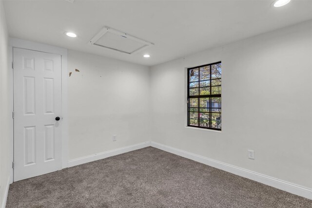 603 Lilly St, Cleburne, TX 76033 - unfurnished room with dark carpet, recessed lighting, and baseboards