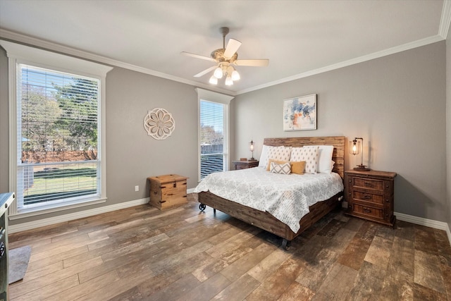 bedroom featuring multiple windows, hardwood / wood-style floors, and crown molding