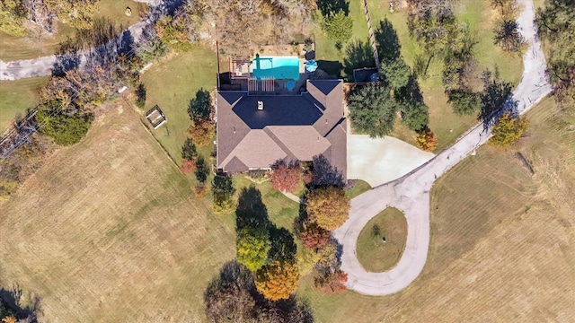 view of front of property with a garage and a front lawn