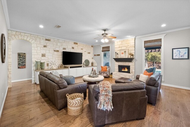 entrance foyer with hardwood / wood-style flooring, crown molding, and a notable chandelier