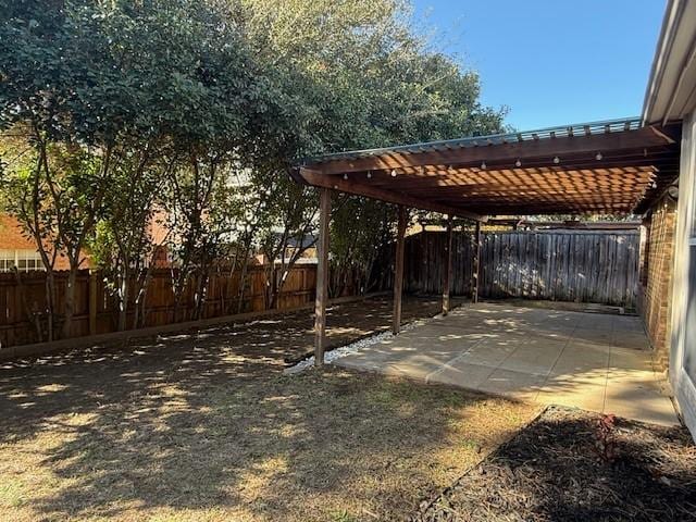 view of yard with a patio area