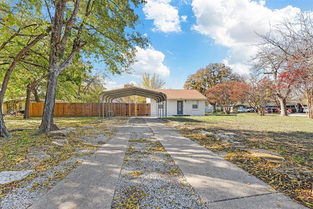 single story home with a carport