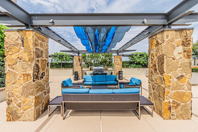 view of patio featuring an outdoor hangout area, area for grilling, a pergola, and exterior kitchen