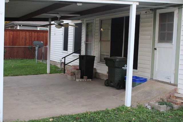 view of patio featuring ceiling fan