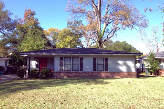 ranch-style house with a front yard