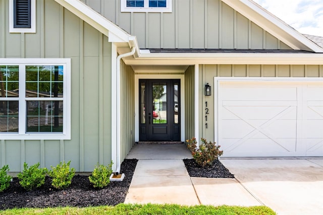 property entrance with a garage