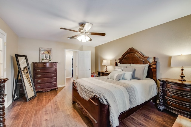 bedroom featuring hardwood / wood-style flooring and ceiling fan