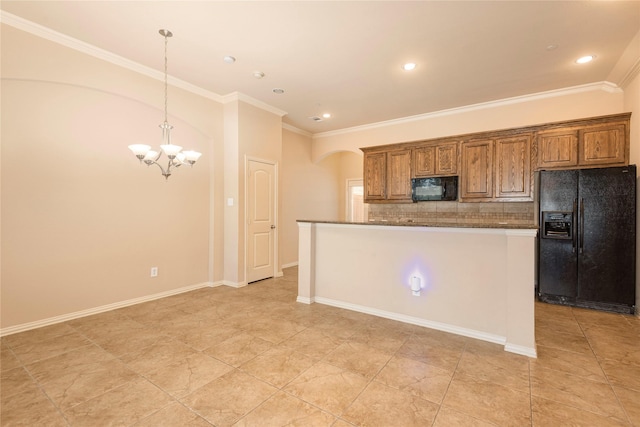 kitchen featuring pendant lighting, tasteful backsplash, ornamental molding, black appliances, and a kitchen island