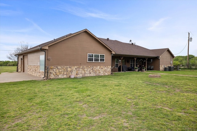 exterior space featuring a garage and a front yard