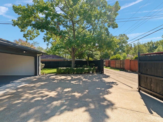 exterior space featuring an outdoor structure and a garage