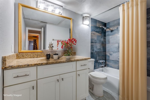 full bathroom with vanity, toilet, and shower / bath combo