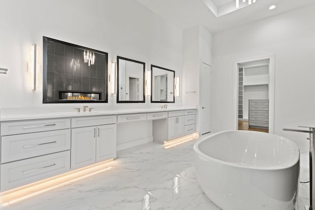 bathroom featuring a bath and vanity