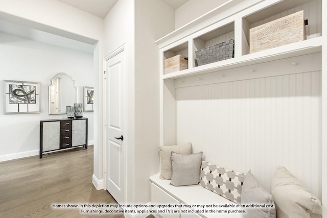 mudroom with wood-type flooring