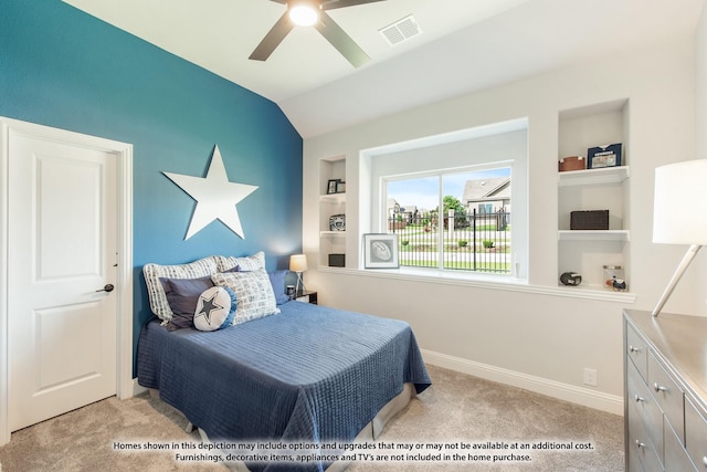 carpeted bedroom with lofted ceiling and ceiling fan