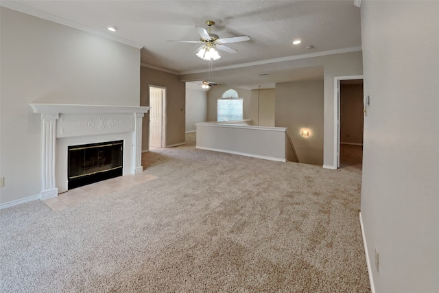 unfurnished living room with light colored carpet, ceiling fan, and crown molding