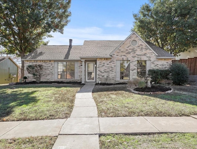 view of front of house with a front lawn