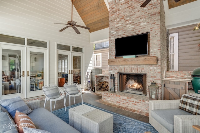 living room featuring an outdoor brick fireplace, ceiling fan, high vaulted ceiling, and wooden ceiling