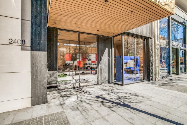 doorway to property with a patio