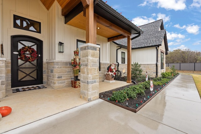 view of exterior entry featuring a porch