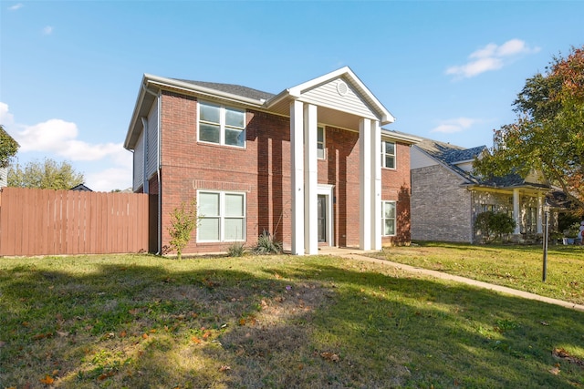 view of front of home featuring a front lawn