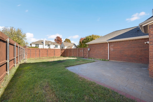 view of yard with a patio area