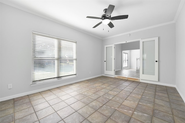 spare room with ceiling fan, crown molding, and french doors