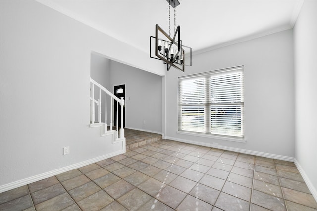 interior space featuring crown molding, tile patterned flooring, and a chandelier